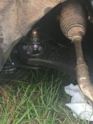 Oil spew on underside of car