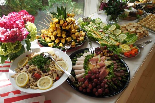 Chipotle lime shrimp & pineapple skewers (has a kick!), and Asparagus & Pear Roulade tray. Both delicious and beautifully presented!