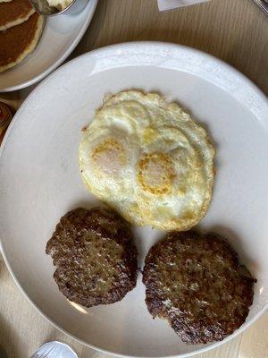 Two eggs and sausage