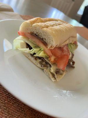 Steak and cheese with lettuce, tomato and mayo