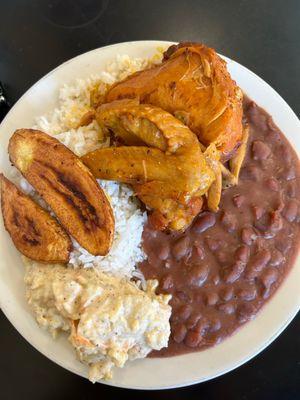 Stew chicken, beans, rice, plantains, and potato salad