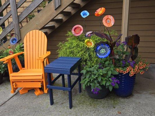 Yard art and Adirondack chairs