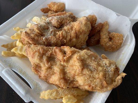 Chicken tenders, shrimp and fries.