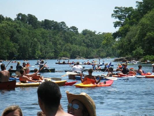 Enjoying a float on the Mt. Fork River close to Broken Bow, OK with canoes, kayaks and tubes from Lucky Dog Resort