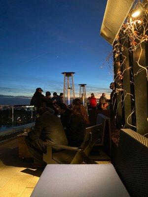 Rooftop bar on the water with heaters