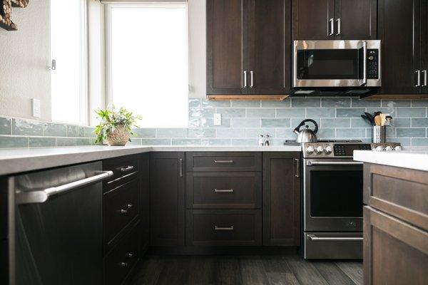 Rebuild kitchen designed by Studio H Designs, Inc. with Schrock Cabinetry