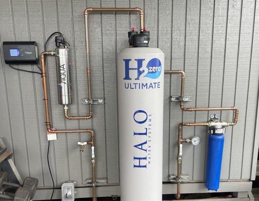 Halo H2Zero Ultimate Whole House Filtration System with a prefilter and UV light sanitation station.