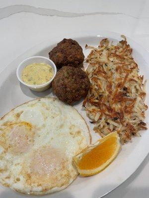 2 eggs over easy with Danish meatballs and hash browns