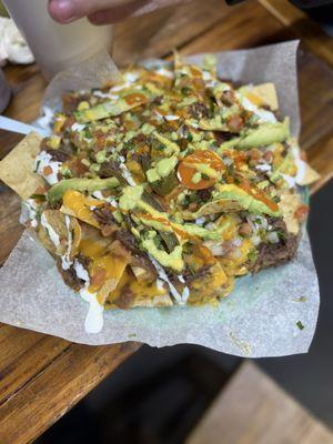 Nachos, Tacos and a birria.   I can never decide so I buy it all.     Great food and friendly staff.     You won't regret eating here.