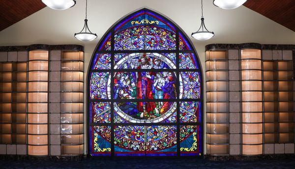 Peacemakers stained glass window on the 2nd fl is inspired by the Sermon on the Mount, aka The Beatitudes. See Jesus and his 12 Apostles.