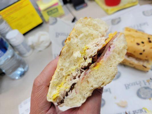 Turkey club on onion roll. Tasty but empty.