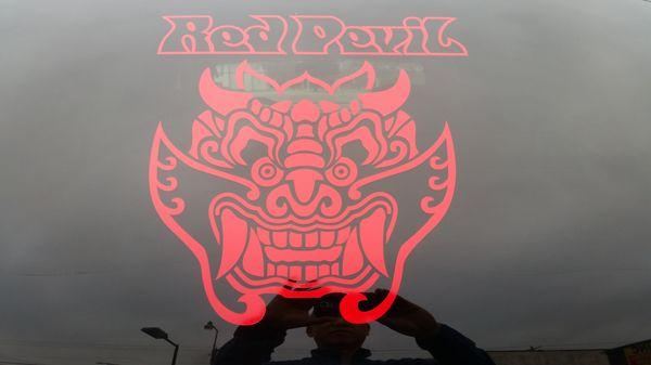 Red Devil  graphic on back glass