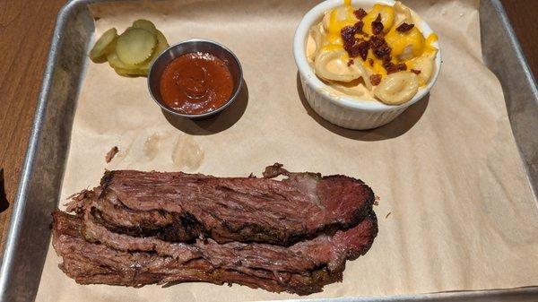 Brisket sliced with the grain instead of against.  A travesty in TX!