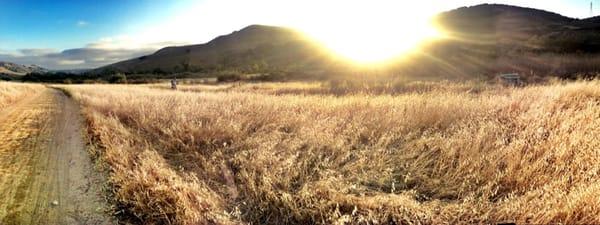 A setting sun over the hills & trails.