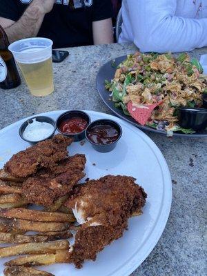 Chicken tenders and loaded chicken nachos