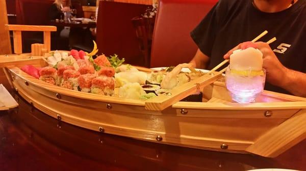 This was very very pretty presentation!!! Really enjoyed the boat of sushi...