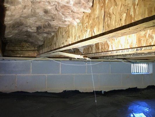 On this Cary new construction home, the floor joists in the crawlspace were damaged during construction. This damage will cause issues later