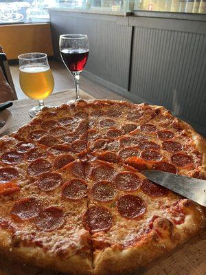 Large pepperoni pizza.