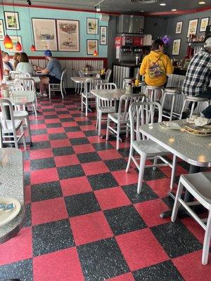 Inside dining where they would not sit me until my one guest arrived