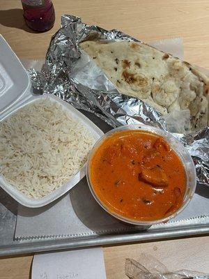 Tikka masala with rice and garlic naan