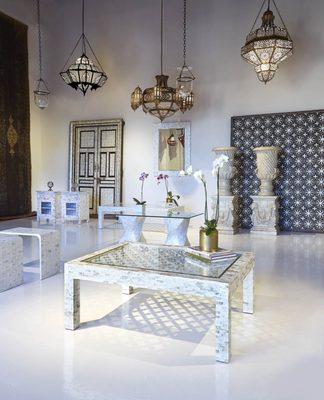 Mother of pearl furnishings and brass lanterns.