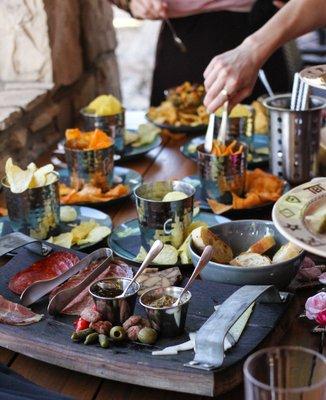 Charcuterie Boards, dips, spreads go perfect with wine and cocktails!