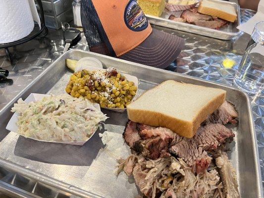 Two meat platter (brisket and pulled pork) with cole slaw and corn/peppers sides.