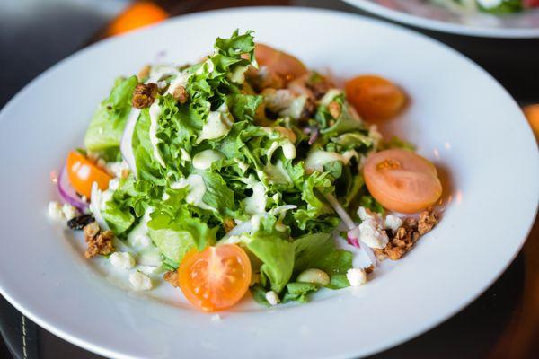 Chopped salad, garlic granola, heirloom tomatoes, green goddess