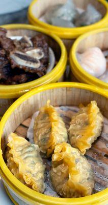 Bottom: Shark Fin Dumplings (魚翅餃): $4.50.  Middle left: Black Pepper Short Ribs (黑椒牛子骨): $6.50.  Middle Right: Shrimp Dumplings (蝦餃): $5.95.