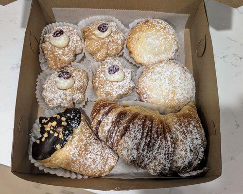 Fried zeppole, mini pie with custard, mushroom with hazelnut, and lobster tail