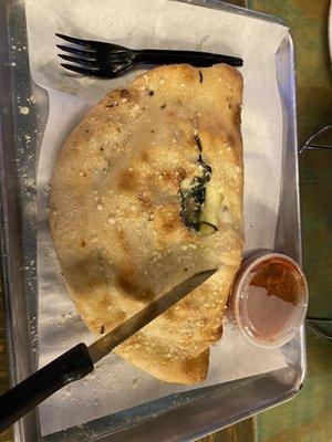 Sliced calzone.  May be slightly smaller than orders past, but still darn good!