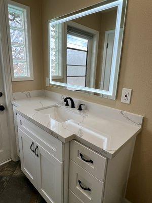 Replaced vanity, Countertop & Mirror