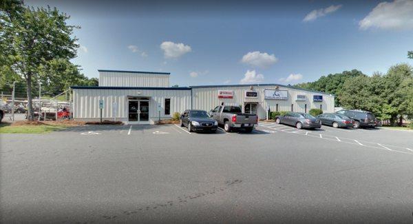 Front exterior of Carolina Golf Cars facilities in North Carolina. Clean, lots of parking, big store.