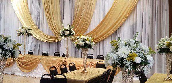 Gold and white anniversary, 2 layer draping.