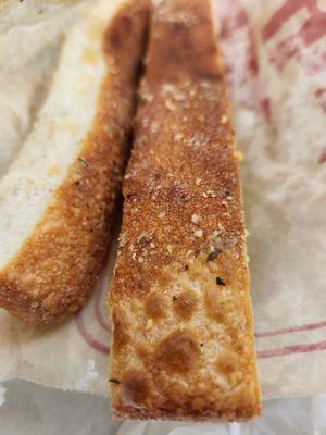 Bread stick without much of the seasoning top that pizza hut bread sticks are known for.