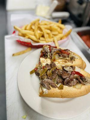 Steak and cheese loaded  And season fries