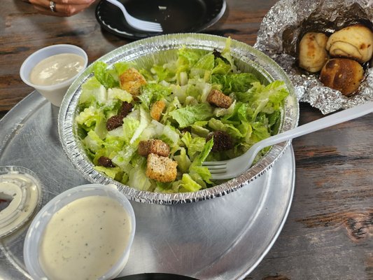 Ok, fresh. Chopped too small. Hard to pick up with the fork. Cesar and ranch dressing are okay. Consistency is a little watery.