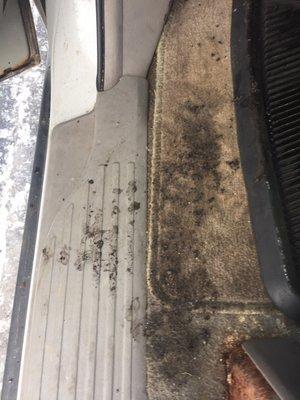 Car left dirty after receiving service. No disposable mat was put in car after service. Left car smelling like grease/oil.