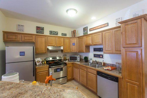 Our 2 bedroom 2 bath kitchen is like none other! Stainless steel appliances, custom cabinets, ceramic tile & an ISLAND!!