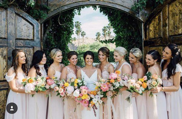 Glowing bride and her maids with natural organic tans