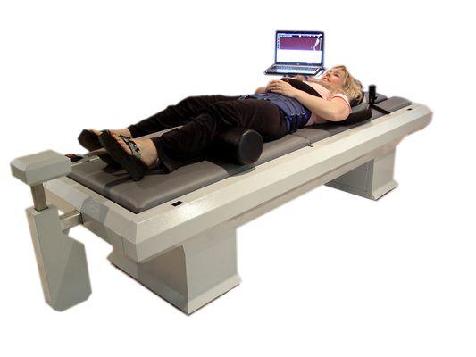 You lay comfortably fully clothed on the VAX-D table while the computer controlled table treats your neck or back.