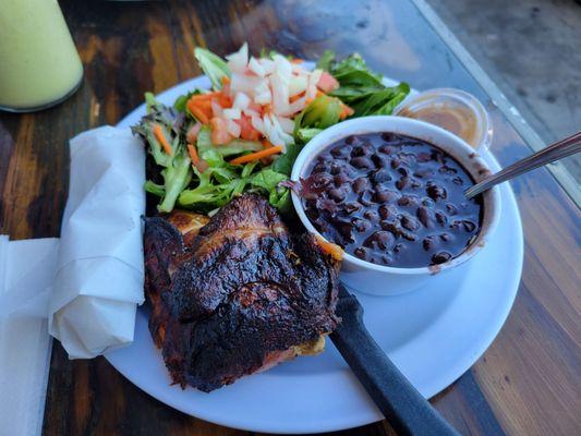 1/4 chicken, beans, spring mix salad, tortilla