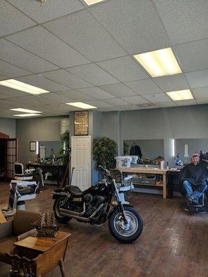 Stations and the owner's Harley on display.