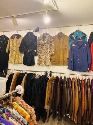 Coats- my leopard purchase hanging on the wall.