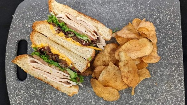 Turkey club. Simple but packed full of flavor. The peppered mayo and candied bacon make this!