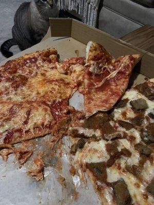 Cheese slipping off the pizza