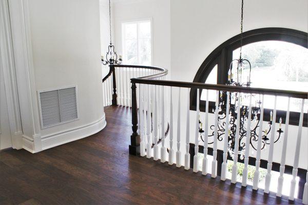 Walnut floor and custom hand railing