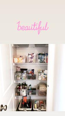 Organized bathroom linen/toiletry closet