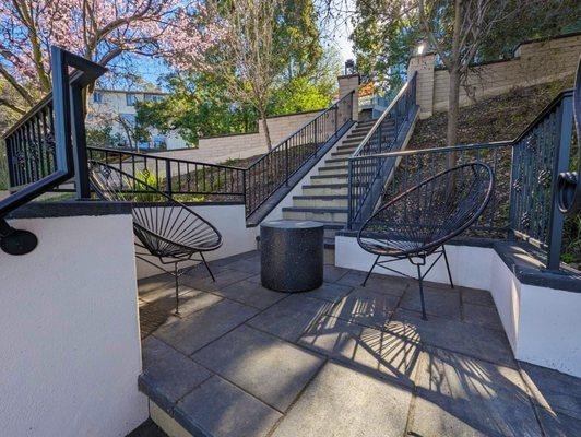 Melville Block and cap. Metal railing.