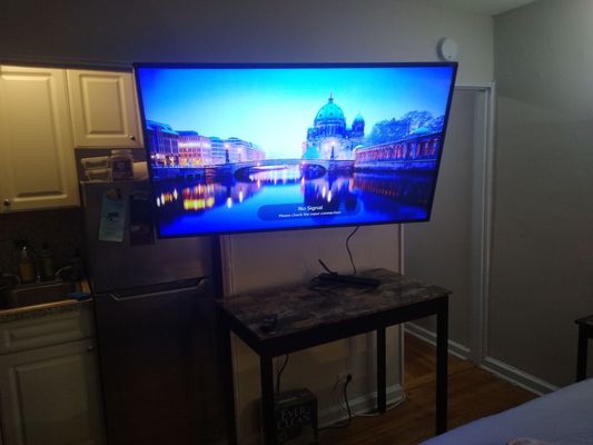 60" TV installation by Throggs Neck